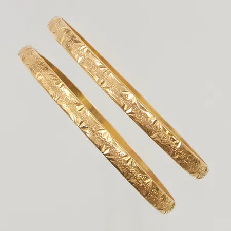 Armringar 2st ca6,6cm skador finns 21K 25,8g.