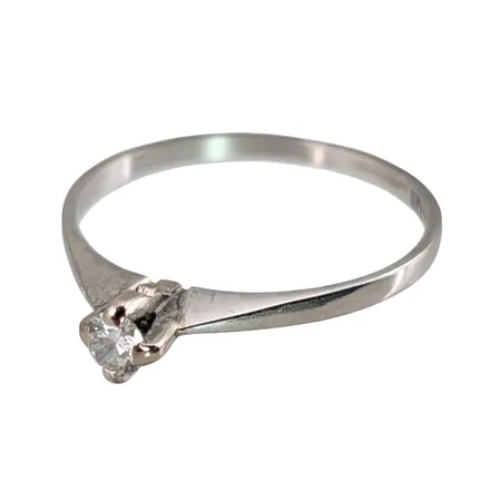Diamantring i 18K vitguld, Diamant 0,10ct, Örns Juvelatelje, Göteborg, svensk kontrollstämpel, stl:17½ mm, bredd 1,3 - 4 mm Vikt: 1,6 g
