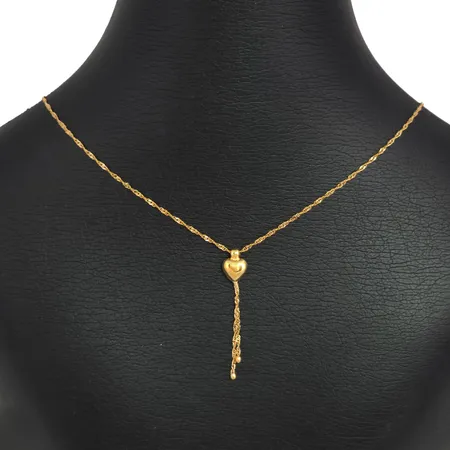 Collier, 18K guld, singaporekedja med integrerat hänge Hjärta, Guldfynd (GFAB), längd 43,5 cm, kedjans bredd 1,2 mm, hängets längd 37 mm, fint skick Vikt: 2,2 g