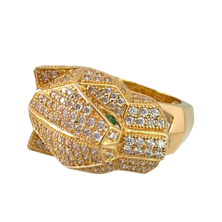 Ring Kattdjur i 18K guld, vita och gröna stenar, stl:17½ mm, bredd 4,5 - 16 mm, fint skick, stenar utan anmärkning Vikt: 8,6 g