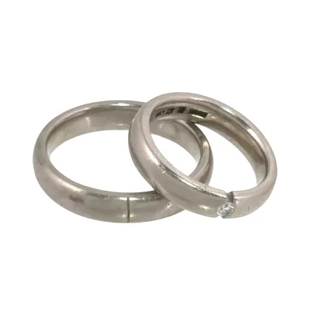 Ringar, två st, 18K vitguld, Diamant 0,05ct, stl:15¼ och 18½ mm, slitage Vikt: 13 g