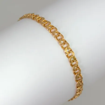 Armband Bismarck, 18K guld, tillverkarstämpel EVJ, Sala, svensk kontrollstämpel, längd knäppt 19,0 cm, bredd 5 mm, fint skick Vikt: 7,7 g