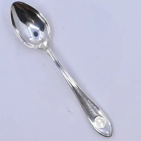 10 skedar längd 11 och 12,5 cm, silver 830/1000. Vikt: 136,5 g