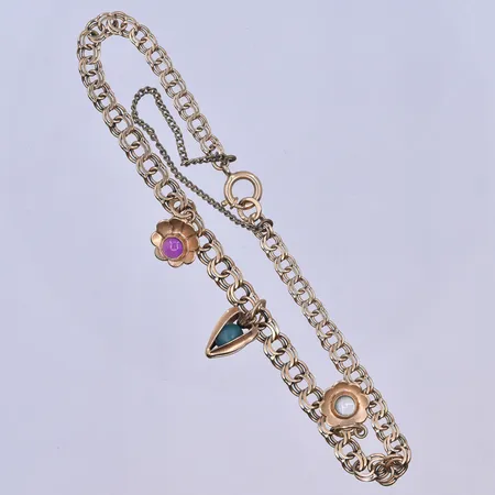 Armband Bismarck med 3 berlocker längd 19,5 cm, bredd 4 mm 18K. Vikt: 7 g