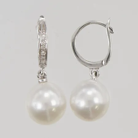 Örhängen diamanter 12x ca 0,01ct, 14K 3,9g.