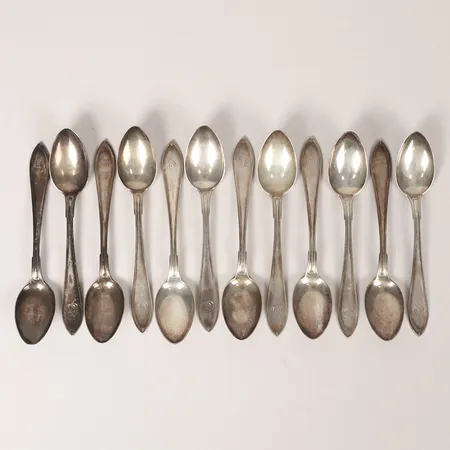 Tolv skedar modell Svensk Spetsig, längd 12,5cm, Dufva AG Stockholm, gravyr, silver 830/1000 Vikt: 195,1 g