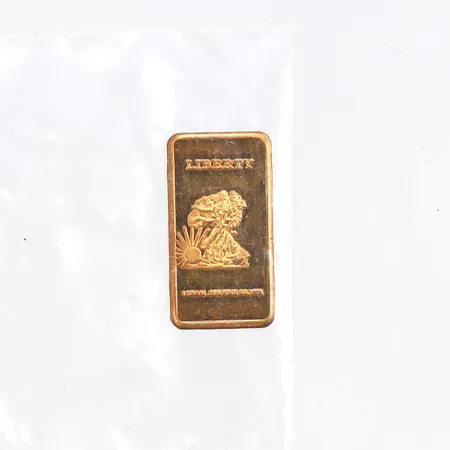 Silvertacka, 1g, förgyllt silver 999/1000.
