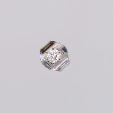 Ett udda örhänge med briljantslipad diamant ca 0,05ct, GHA, vitguld 18K Vikt: 0,3 g