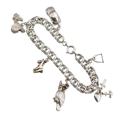 Armband Bismarck med berlocker silver, längd 20 cm, bredd 8 mm, berlocker med varierande mått  Vikt: 28,9 g