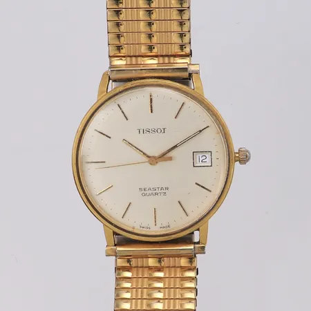 Armbandsur Tissot Seastar 18K quartz, Ø34mm datum, flexband, repigt glas, personlig gravyr 18K Vikt: 0 g