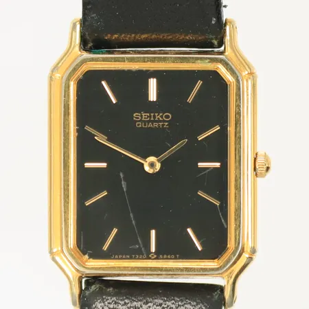 Damur Seiko Quartz, 20x20mm, läderband, sliten boett, behov att batteribyte.