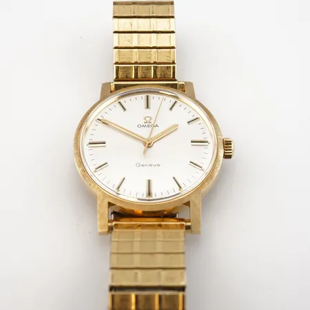Herrur Omega, manuell, ca 34mm, 14k, gravyr bakboett