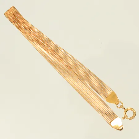 Armband längd 18,7cm, bredd 7mm, vridna länkdelar, 21K, 4,8g Vikt: 4,8 g