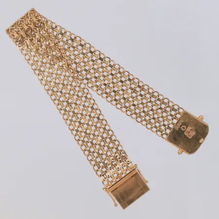 Armband X-länk Ädelsmycken Aktiebolag år 1967 Stockholm längd ca 18cm bredd 15,8mm 18K Vikt: 18,3 g