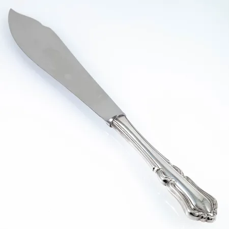 Tårtkniv Harmoni i silver med rostfritt blad. Längd 249 mm. Bruttovikt 83,1g. MEMA från 1979. Fint skick.