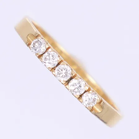 Ring med dia tot 0,40ctv enl gravyr stl 20¾ bredd 3mm gravyr 18K Vikt: 3,9 g