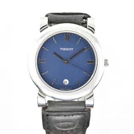 Herrur Tissot Swiss Pack, stål, quartz, Ø35mm, refnr F385, ETA 955.412, datum, safirglas, blå urtavla, läderband med viklås ej original, 1990-tal, behov av batteribyte, inga tillbehör.