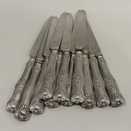 11 bordsknivar blad i silver 21cm, silver 830/1000 Vikt: 529,4 g