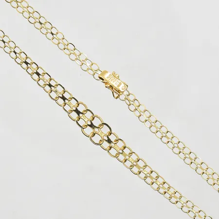 Collier X-länk doserad längd 45cm, bredd 5-9mm, ojämnheter på länk förekommer, 18K. Vikt: 10,5 g