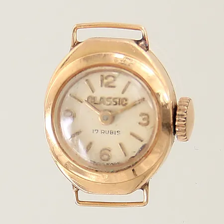 Damur Classic 18K manuell Ø15mm, repig, bucklig, fungerar ej, inga tillbehör, bruttovikt: 4,5g