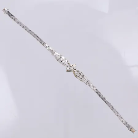 Armband diamanter 9 x 0,06ct 18,8cm bredd 4-13mm vitguld, 18K Vikt: 16,9 g