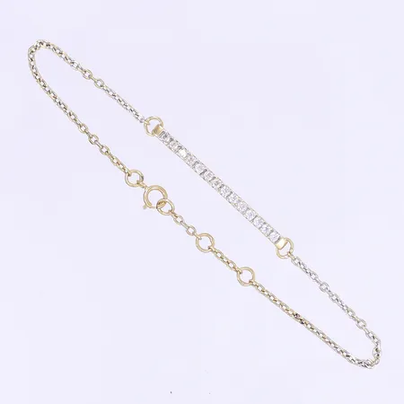 Armband med vita stenar längd 19cm bredd 2-3mm 18K Vikt: 3,1 g