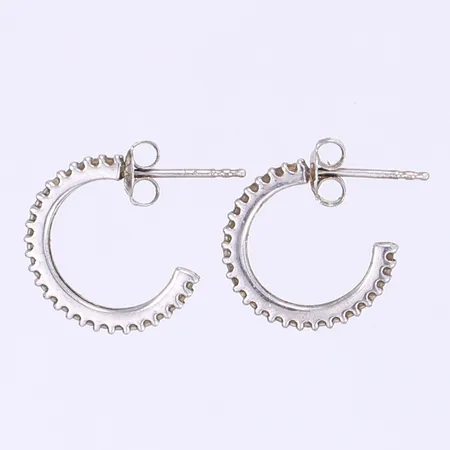 Ett par örhängen med vita stenar Ø15mm silver 925/1000 Vikt: 1,8 g