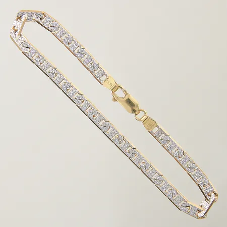 Armband längd 17,5cm bredd 4,2mm vitguldsdetaljer på länk 18K Vikt: 7,9 g