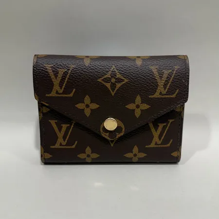 Plånbok Louis Vuitton Victorine monogramcanvas 12x9,5x2,5cm, modell-nr: M62472, datumkod MI3168, bruksslitage vid knapp, kvitto från Louis Vuitton Birger Jarlsgatan, dustbag, inga andra tillbehör