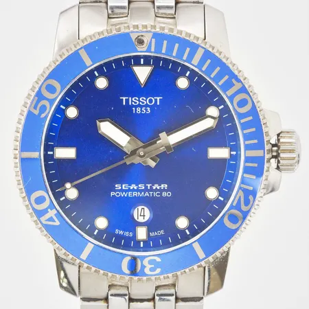 Herrur Tissot Seastar Powermatic 80 stål automat Ø: ca 43mm refnr: T120407A serienr: 6MQ FXJ BHL datum glasbaksida stålarmband viklås bruksskick inga tillbehör 