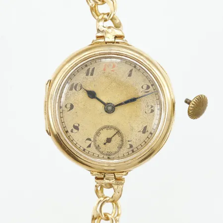 Damur Zenith 18K manuell Ø26mm boett.nr:253843 armband Bismarck med säkerhetskedja 18K, liten sekundvisare, defekt krona samt lås, går ej, inga tillbehör Vikt: 24 g