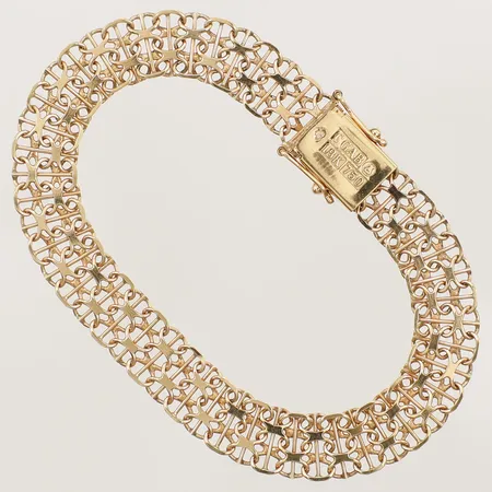 Armband X-länk längd 18cm bredd 9,1mm 18K Vikt: 11,1 g