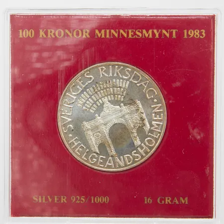 Minnesmynt Sveriges riksdag Helgeandsholmen år 1983 nominellt värde 100kr, plast etui silver 925/1000, 16g Vikt: 16 g