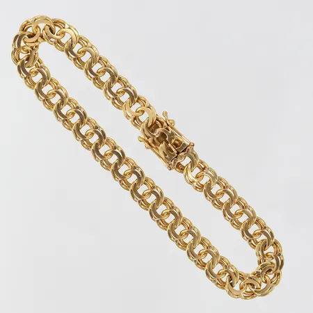 Armband Bismarck längd 18,5cm bredd 6,5mm Lars Rosengren Guldsmedsverkstad 1973 18K. Vikt: 17,7 g