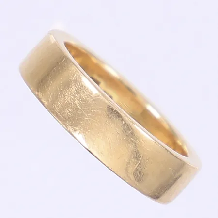 Ring slät stl 16¼ bredd 5mm gravyr 18K Vikt: 8,3 g