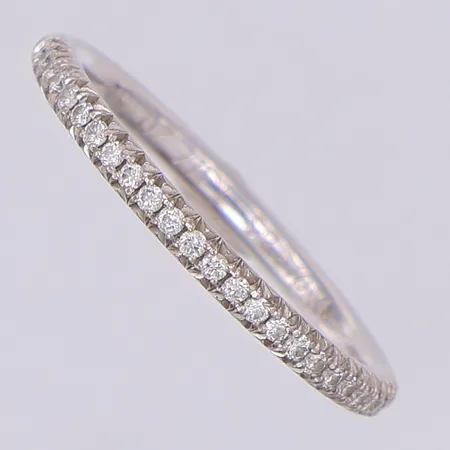 Ring halvallians diamanter 25 x ca 0,005ct stl:16¼ vitguld, gravyr, 18K Vikt: 2,3 g