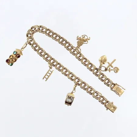 Armband Bismarck med 5 berlocker, längd 20,5cm, bredd 7mm, sten saknas, 18K Vikt: 24,7 g