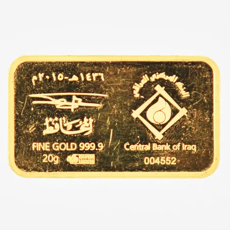 Guldtacka Central Bank of Iraq serienummer: 004552 30x17mm bruten plombering 24K Vikt: 20 g