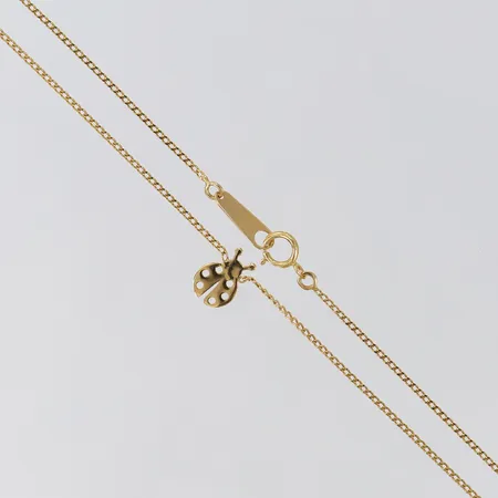 Collier med integrerat hänge längd 34,5cm bredd 1-9mm 18K. Vikt: 1,5 g