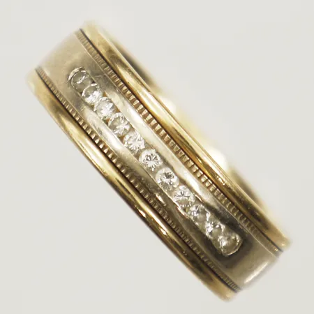 Ring med diamanter 11xca0,002ct stl: 20 bredd 7,0mm tvåfärgad 14K  Vikt: 8,6 g