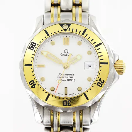 Damur Omega Seamaster professional, guld på stål, quartz, Ø28mm, serienummer 56355874, datum, länkens innermått 17cm, viklås, större repa vid nr 30 på ring, i behov av batteribyte, inga tillbehör Vikt: 0 g