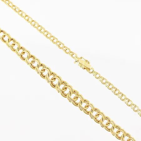 Collier doserad Bismarck längd 54cm, bredd 4-8mm, defekt lås, uttöjd/skeva länkbitar, 18K. Vikt: 29,6 g