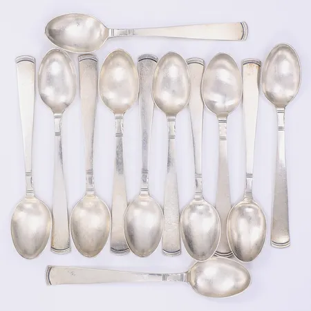 12 Kaffeskedar modell Rosenholm design Jacob Ängman för GAB, Stockholm 1934, dessa exemplar 1970-tal längd 11,7cm repor silver 830/1000 Vikt: 183,9 g