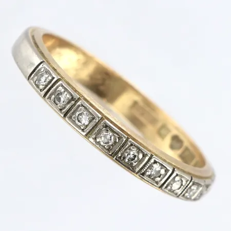 Ring med diamanter 10 x ca 0,01ct stl:18¼, bredd 3mm, gravyr, tvåfärgad, 18K Vikt: 3,8 g