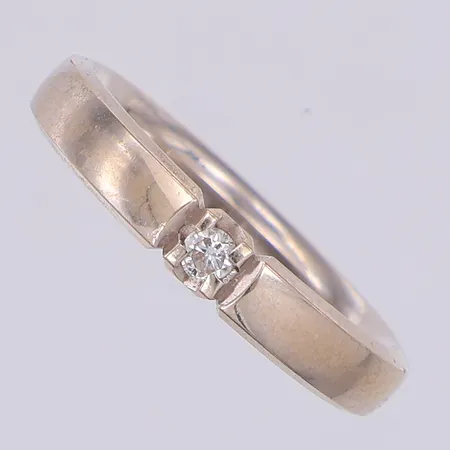 Ring diamant 1 x ca 0,05ct stl:16½ vitguld, 18K Vikt: 4,2 g