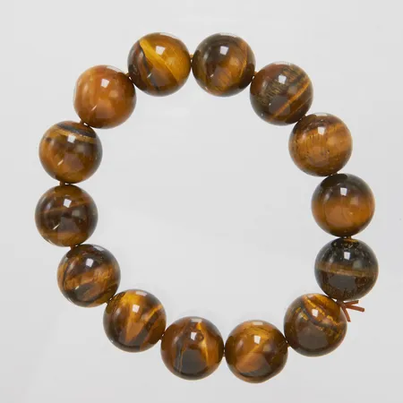 Armband med tigeröga Ø14mm, elastiskt.