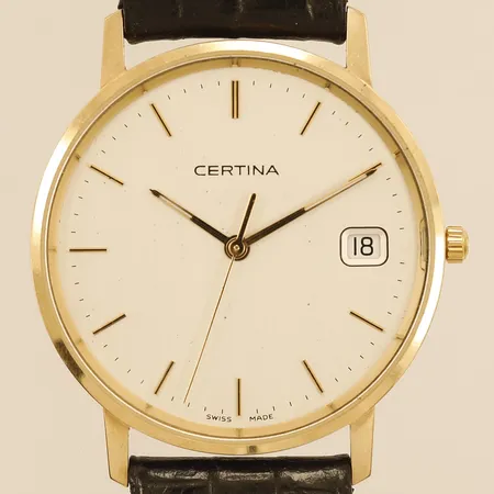 Herrur Certina guld quartz Ø33mm armband 23cm inklusive bandet gravyr batteribyte krävs 18K i boetten.