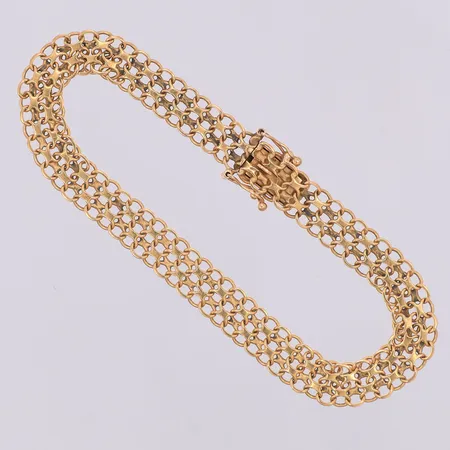 Armband X-länk 18,4cm bredd 7,5mm, Present AB år 1965, 18K Vikt: 8,7 g