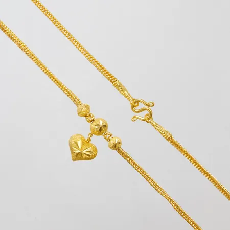 Collier Rävsvans med integrerat hänge hjärta, längd: 46cm, bredd: 2,8mm, Thaiguld 1 Baht, skada på länken, 23K Vikt: 15,2 g