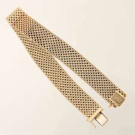 Armband halvstel längd 19cm bredd 12mm skev 18K Vikt: 25,2 g